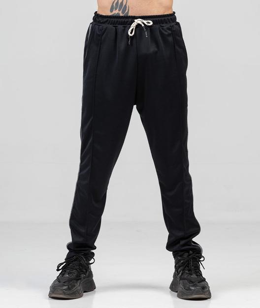Oferta de Pantalón rústico deportivo wevenit con alforzas y tiras laterales combinadas por $47999 en Abstracta